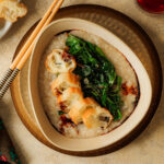 Congee mit Spinat und Youtiao